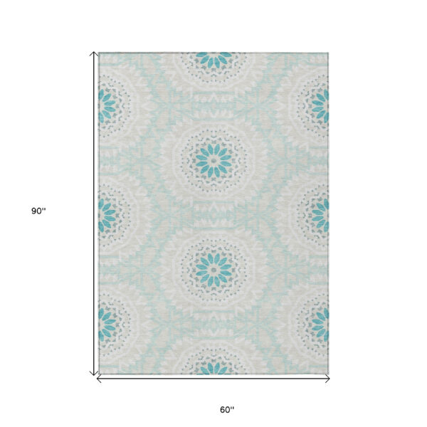 5' X 8' Teal Blue Beige And Ivory Floral Medallion Washable Indoor Outdoor Area Rug