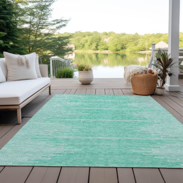 9' X 12' Aquamarine And Ivory Abstract Washable Indoor Outdoor Area Rug