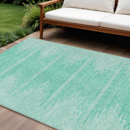 9' X 12' Aquamarine And Ivory Abstract Washable Indoor Outdoor Area Rug