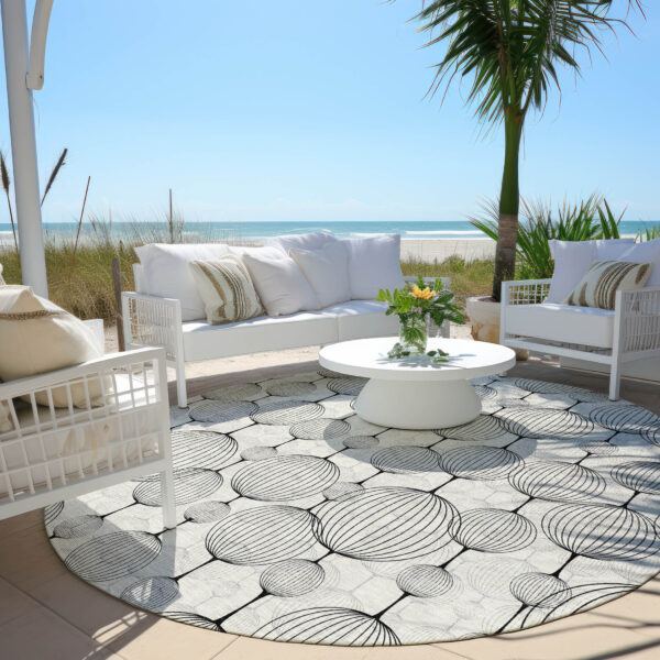 8' Graphite Gray And Silver Round Geometric Washable Indoor Outdoor Area Rug