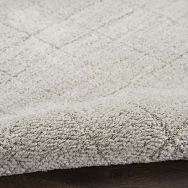 8' x 10' Beige and Ivory Abstract Power Loom Area Rug