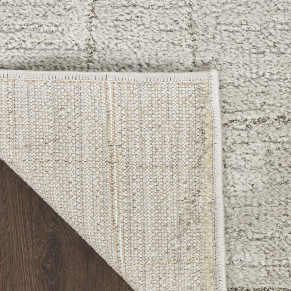 8' x 10' Beige and Ivory Abstract Power Loom Area Rug
