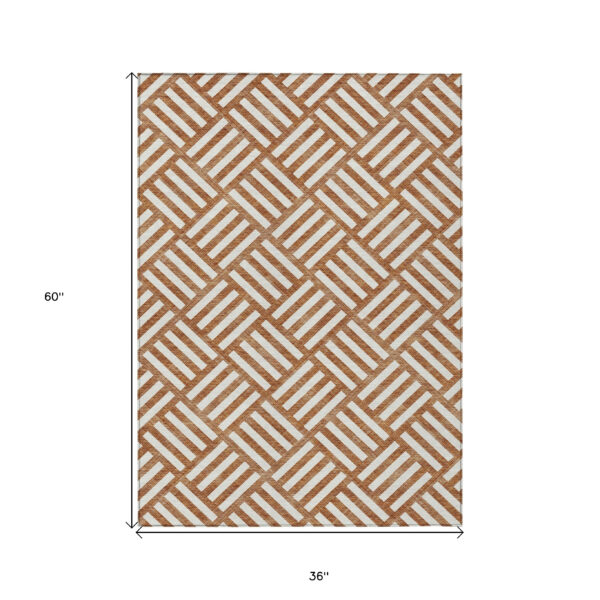 3' X 5' Orange And Ivory Geometric Washable Indoor Outdoor Area Rug