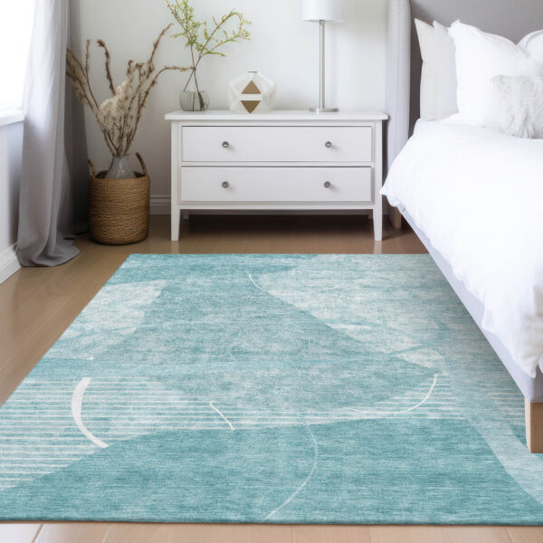 9' X 12' Turquoise Teal Blue And Ivory Abstract Washable Indoor Outdoor Area Rug
