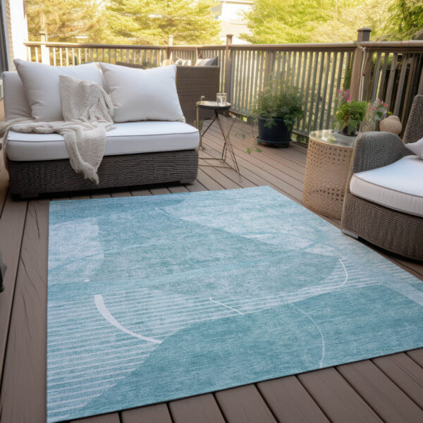 9' X 12' Turquoise Teal Blue And Ivory Abstract Washable Indoor Outdoor Area Rug