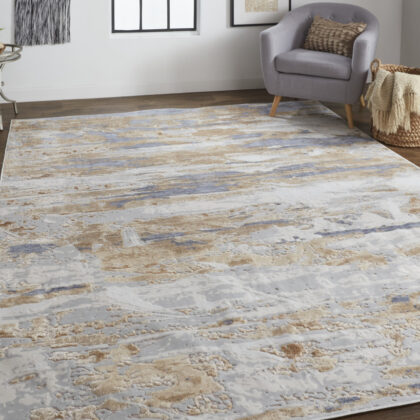 8' X 10' Tan Orange And Ivory Abstract Power Loom Distressed Area Rug