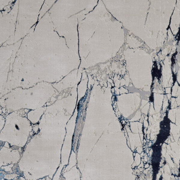 5' x 8' Ivory and Blue Marble Power Loom Distressed Area Rug