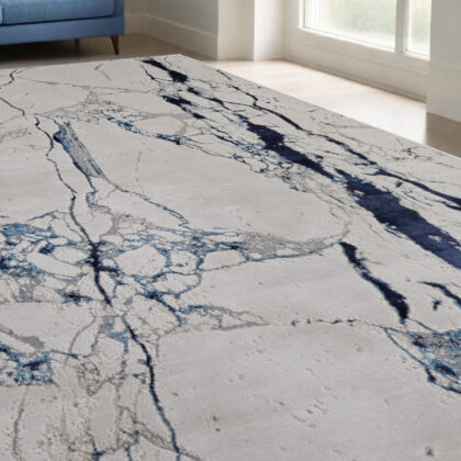 5' x 8' Ivory and Blue Marble Power Loom Distressed Area Rug