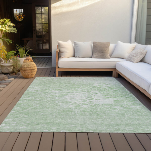 10' X 14' Mint Green And Ivory Abstract Washable Indoor Outdoor Area Rug