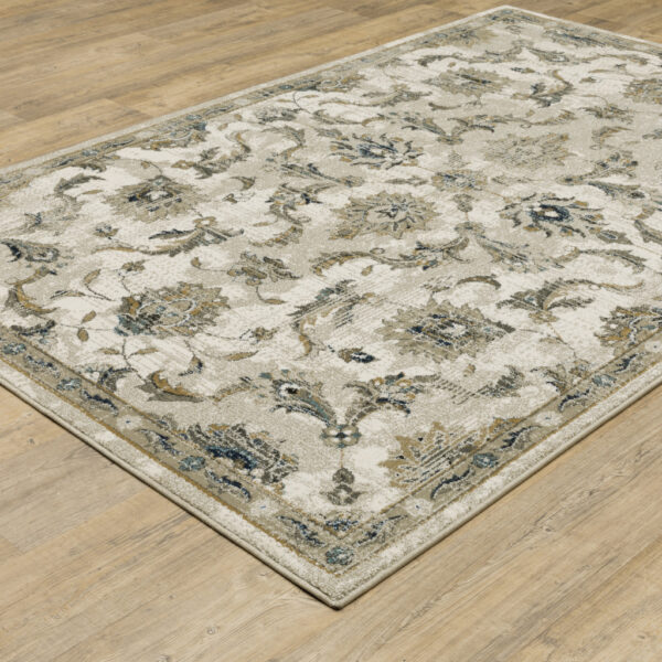 5' X 7' Beige Gold Blue And Grey Oriental Power Loom Stain Resistant Area Rug