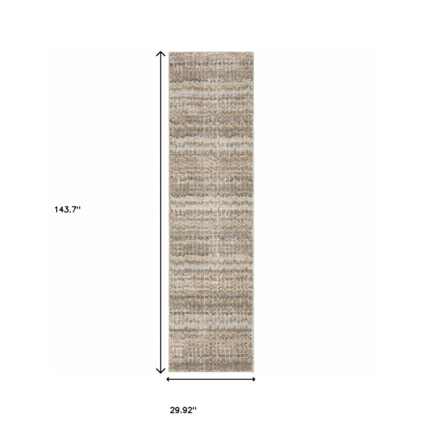 2' X 10' Ivory Grey Tan And Brown Abstract Power Loom Stain Resistant Runner Rug