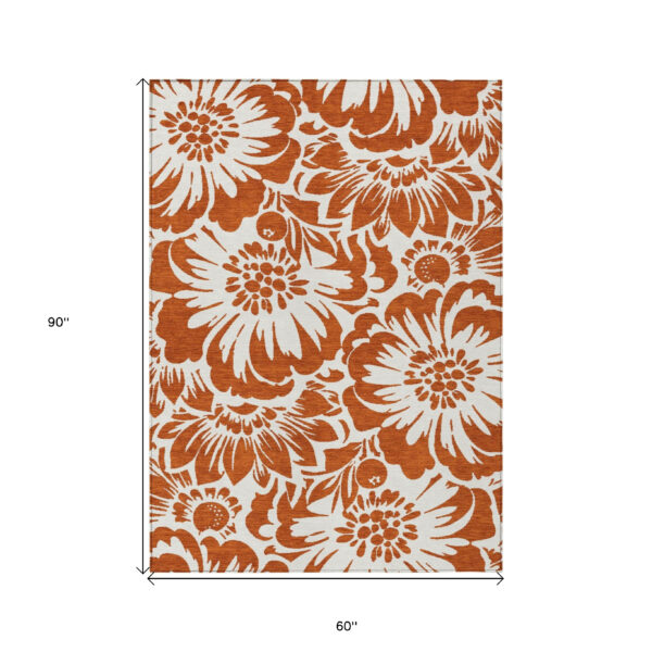 5' X 8' Rust and Ivory Floral Washable Non Skid Indoor Outdoor Area Rug
