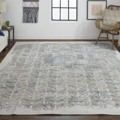 8' X 10' Green Blue And Ivory Abstract Hand Woven Area Rug