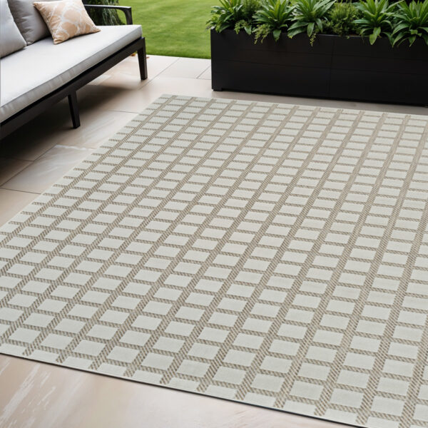 5' X 7' Cream and Beige Geometric Distressed Indoor Outdoor Area Rug