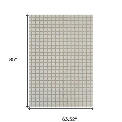 5' X 7' Cream and Beige Geometric Distressed Indoor Outdoor Area Rug