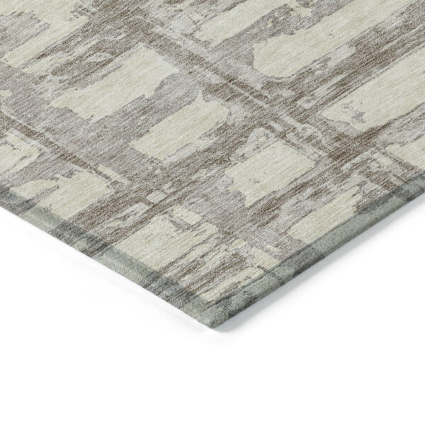 8' Beige Brown And Taupe Round Striped Washable Indoor Outdoor Area Rug