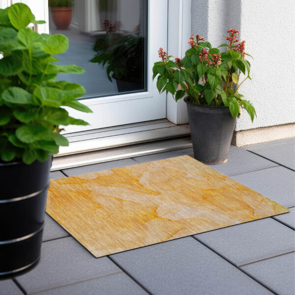 2' X 3' Orange Abstract Washable Non Skid Indoor Outdoor Area Rug