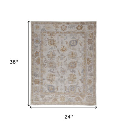 2' X 3' Ivory and Tan Medallion Handmade Distressed Indoor Outdoor Area Rug