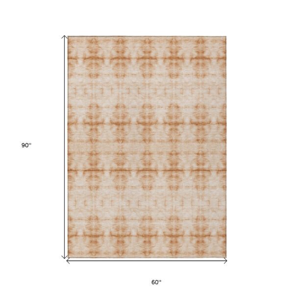 5' X 8' Salmon And Ivory Geometric Washable Indoor Outdoor Area Rug