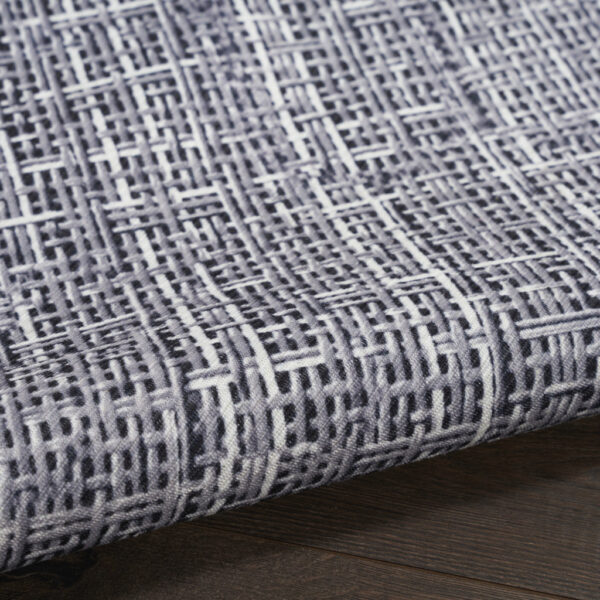 5' x 7' Gray and Ivory Abstract Power Loom Washable Non Skid Area Rug