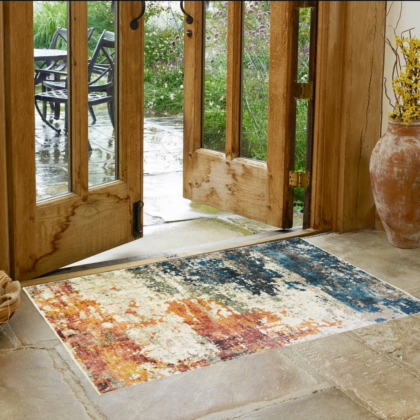 2' x 3' Beige Blue and Ivory Abstract Distressed Area Rug With Fringe