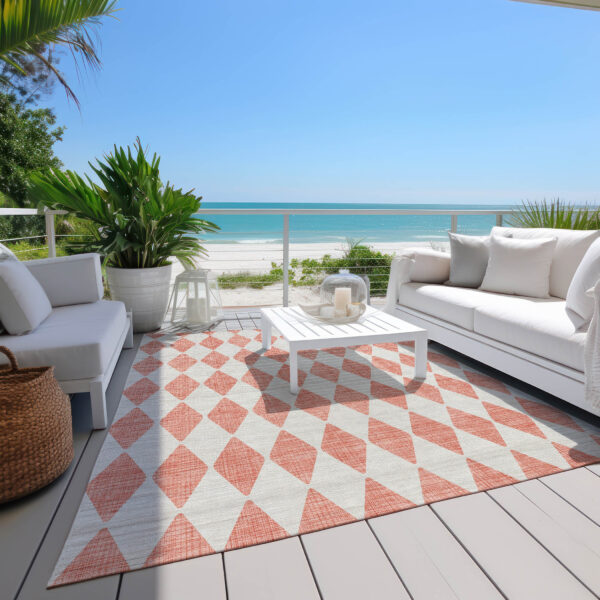 5' X 8' Salmon And Ivory Geometric Washable Indoor Outdoor Area Rug