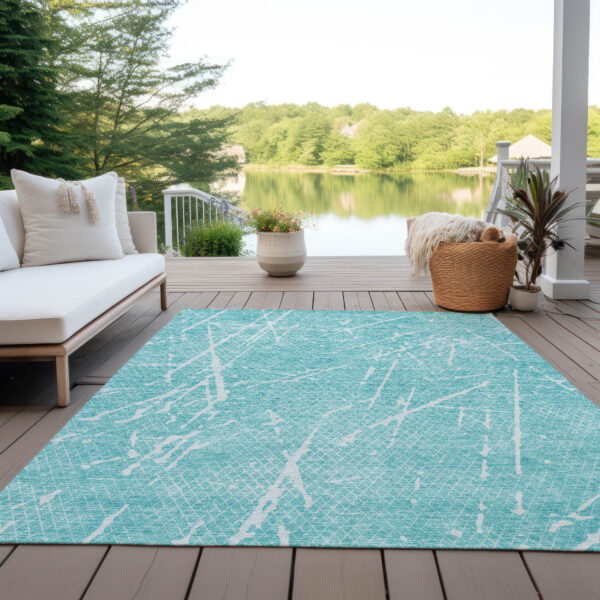 3' X 5' Teal Blue And Ivory Abstract Washable Indoor Outdoor Area Rug