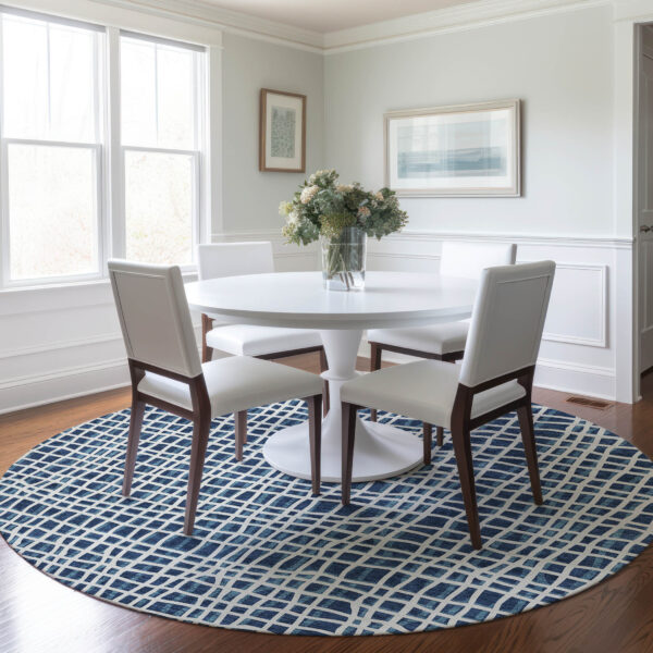8' Navy Blue And Ivory Round Striped Washable Indoor Outdoor Area Rug