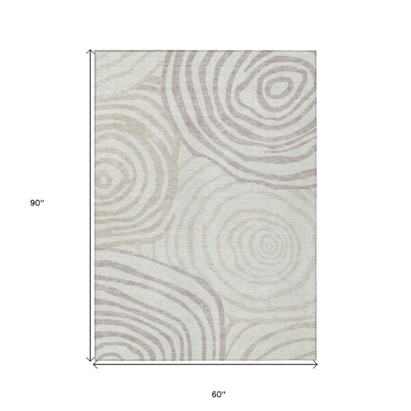 5' X 8' Ivory Beige And Khaki Abstract Washable Indoor Outdoor Area Rug