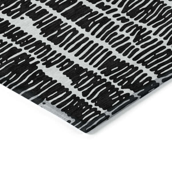 5' X 8' Black And Ivory Abstract Washable Indoor Outdoor Area Rug