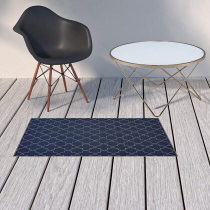 2' X 4' Blue and Ivory Geometric Stain Resistant Indoor Outdoor Area Rug