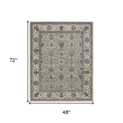 4' X 6' Taupe Ivory And Blue Wool Floral Tufted Handmade Stain Resistant Area Rug