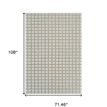 6' X 9' Cream and Beige Geometric Distressed Indoor Outdoor Area Rug