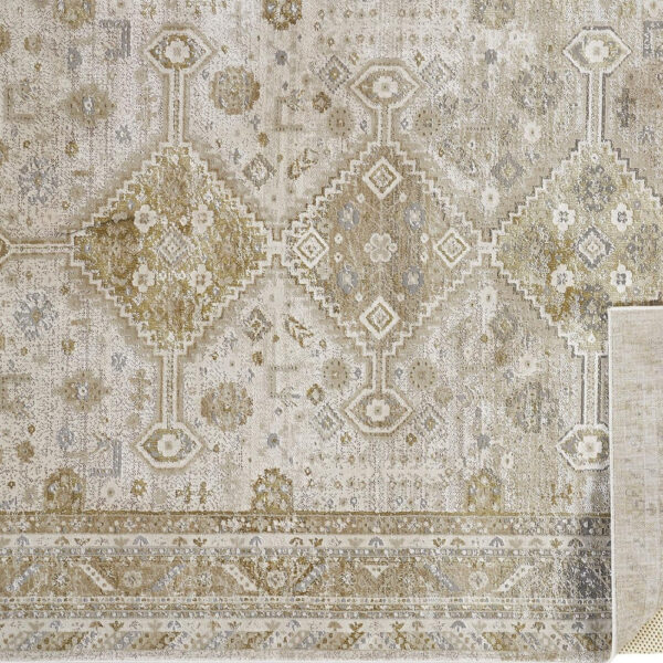 5' X 8' Gold And Ivory Floral Stain Resistant Area Rug
