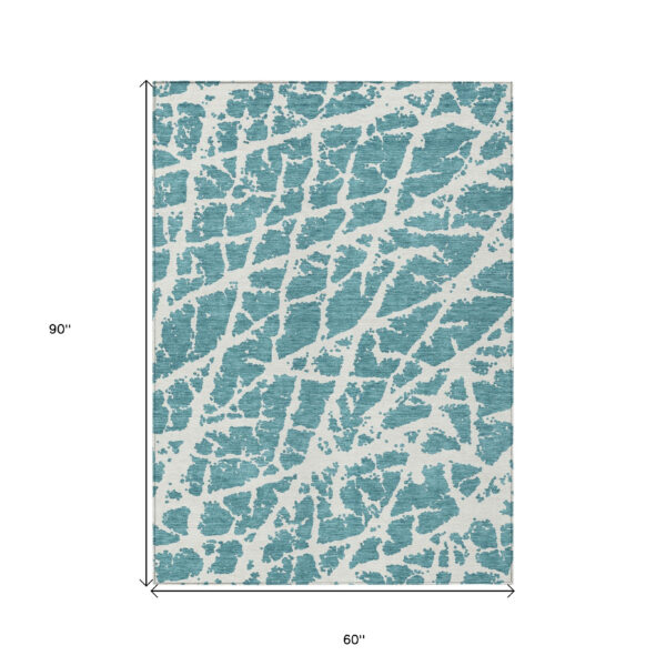 5' X 8' Teal Abstract Washable Non Skid Indoor Outdoor Area Rug