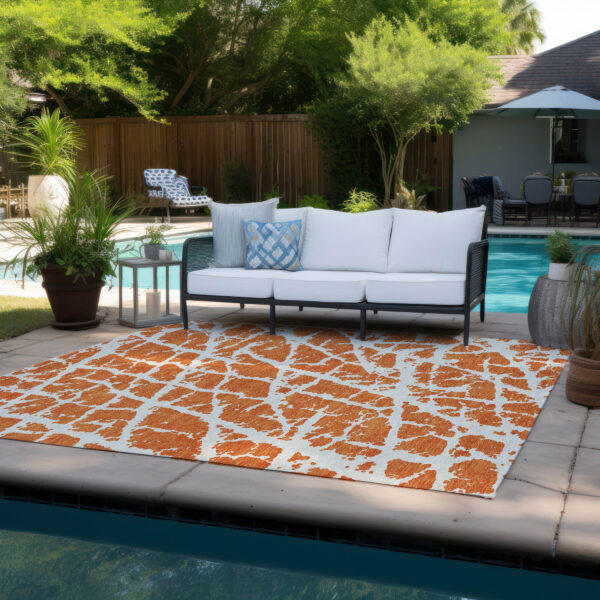 10' X 14' Orange and White Abstract Washable Non Skid Indoor Outdoor Area Rug