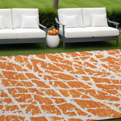 10' X 14' Orange and White Abstract Washable Non Skid Indoor Outdoor Area Rug