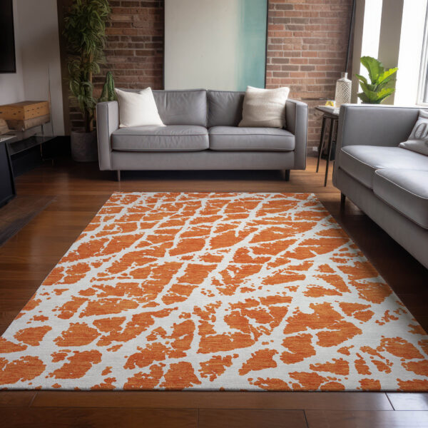 10' X 14' Orange and White Abstract Washable Non Skid Indoor Outdoor Area Rug