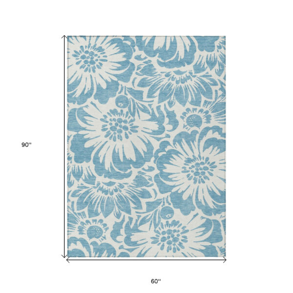 5' X 8' Denim and Ivory Floral Washable Non Skid Indoor Outdoor Area Rug