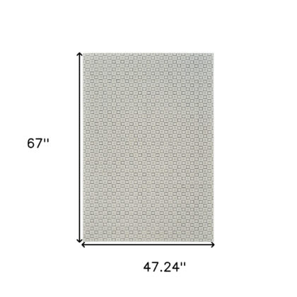 4' X 6' Cream and Beige Geometric Distressed Indoor Outdoor Area Rug