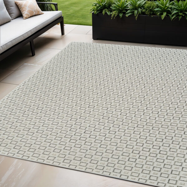 5' X 7' Cream and Beige Geometric Distressed Indoor Outdoor Area Rug