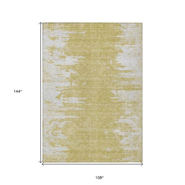 9' X 12' Gold And Ivory Abstract Washable Indoor Outdoor Area Rug