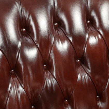 69" Brown And Walnut Top Grain Leather Curved Loveseat and Toss Pillows