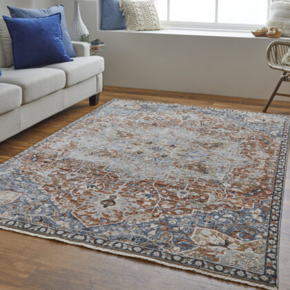 8' X 10' Orange Ivory And Blue Floral Power Loom Area Rug With Fringe