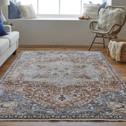 8' X 10' Orange Ivory And Blue Floral Power Loom Area Rug With Fringe