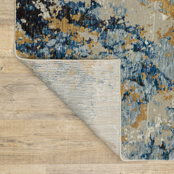 9' X 12' Gold Grey And Ivory Abstract Power Loom Stain Resistant Area Rug