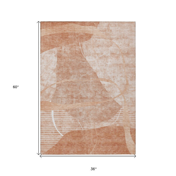 3' X 5' Salmon Copper And Ivory Abstract Washable Indoor Outdoor Area Rug