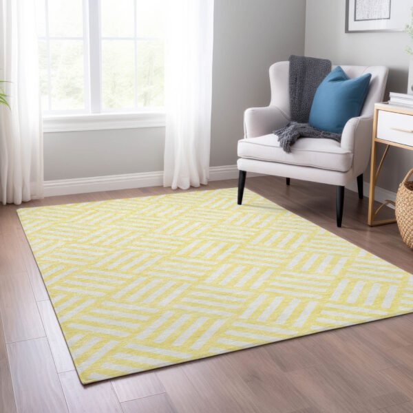 5' X 8' Yellow And Ivory Geometric Washable Indoor Outdoor Area Rug