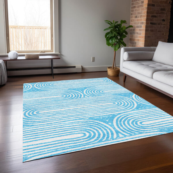 10' X 14' Teal and White Abstract Washable Non Skid Indoor Outdoor Area Rug