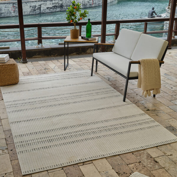 6' X 9' Cream and Beige Striped Distressed Indoor Outdoor Area Rug
